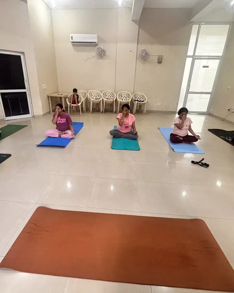 The Living Yog studio with mats laid out before class